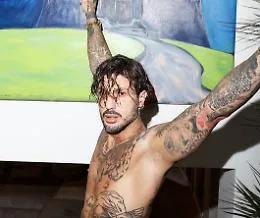 Fabrizio Corona scrive autobiografia: "Belen e la Moric non erano vero amore"