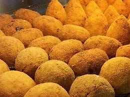 Arancino o arancina? il sole da mangiare che unisce la Sicilia

