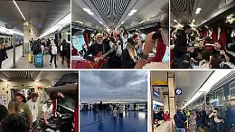 22 ore di treno per raggiungere l'Isola: le foto del viaggio sul Sicilia Express tra stazioni, brindisi e abbracci
