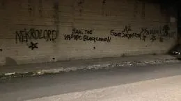 Nel giorno del compleanno del beato Livatino scritte in stile black metal e simboli estremisti sul muro 