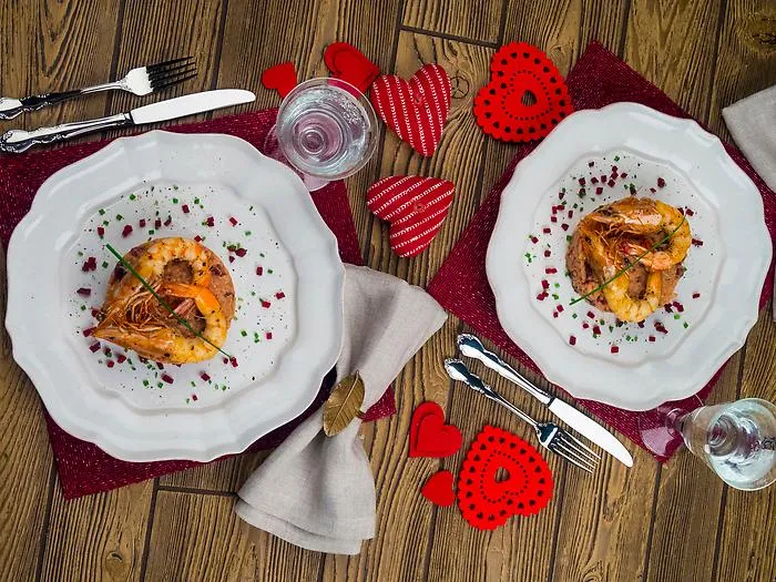 Il men&ugrave; di San Valentino: una promessa sussurrata tra una portata e un buon calice 